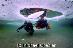 Ice Divers using cave techniques at the start of their di... by Michael Grebler 